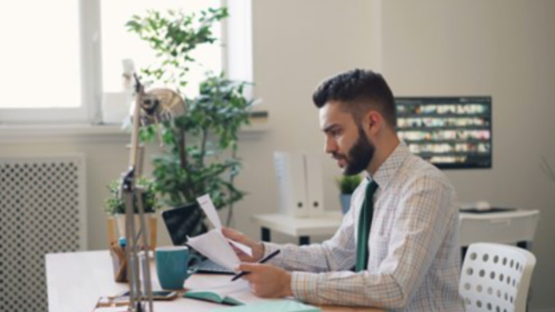 Man reading a report